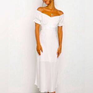 NWT Petal and Pup Oralie dress in white. Never been worn!